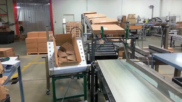 Boxes on Impack Packaging Collecting Table