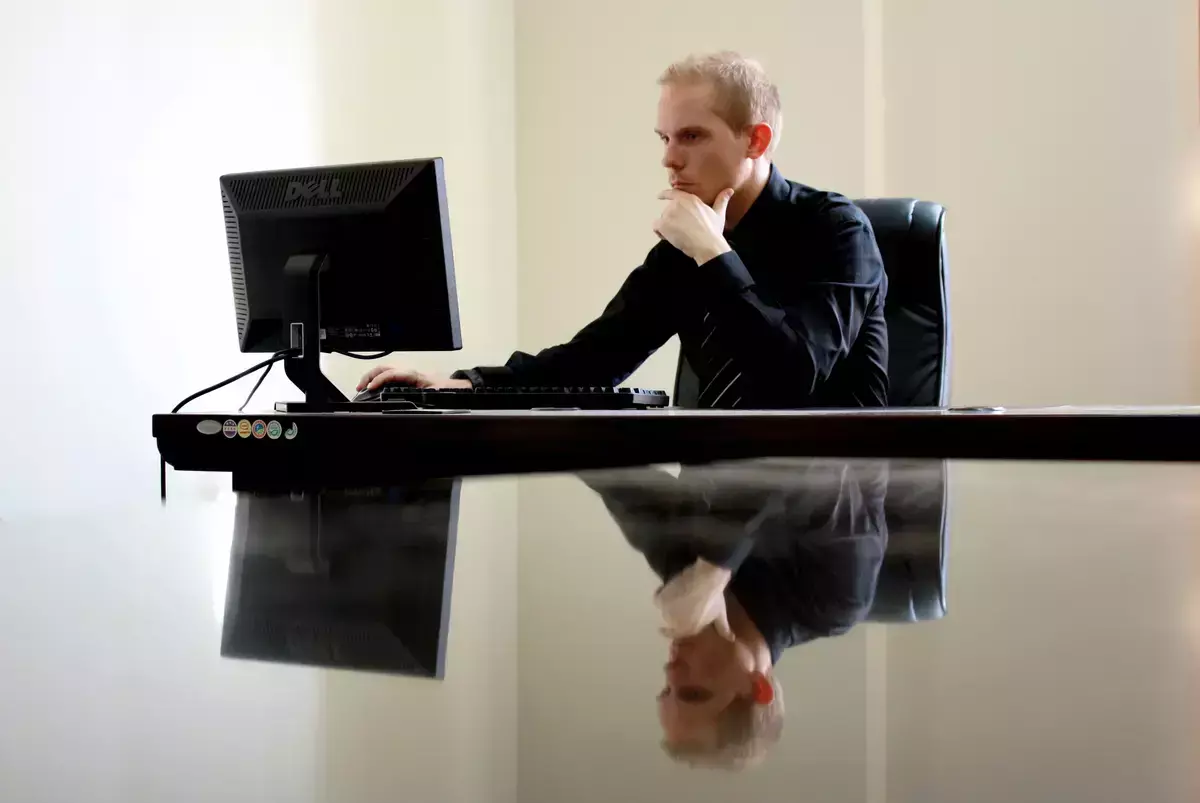 man in front computer